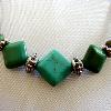 Magnesite beads withantiqued silver plated spacer beads on a velvet cord

19 cm expands to 24 cm

Silver plated clasp