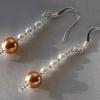 White and gold glass pearl earrings (34mm drop)

Pearl sizes 4mm, 8mm

Silver plated