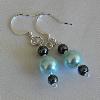 Dark gray and light blue glass pearl earrings (23mm drop)

Pearl sizes 4mm, 8mm

Silver plated