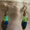 Light blue with specks and dark blue Lampwork Glass earrings (23mm drop)

Bead sizes 8mm, 12mm

Silver plated