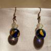 Clear and dark blue with yellow flower Lampwork Glass earrings (23mm drop)

Bead sizes 8mm, 12mm

Silver plated