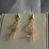 Czech glass seed bead earrings (25mm drop)

Bead size 11/0 seed bead

Silver plated
