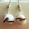 Lampwork glass earrings (25mm drop)

Bead size 5mm, 15mm

Silver plated