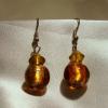 Gold foil Lampwork Glass earrings (23mm drop)

Bead sizes 8mm, 12mm

Silver plated