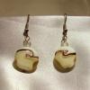 White-cream Lampwork Glass earrings with purple swirls (23mm drop)

Bead sizes 4mm, 14mm

Silver plated