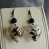 Lampwork glass heart earrings (33mm drop)

Bead sizes 6mm, 20mm

Silver plated