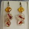 Lampwork glass earrings (41mm drop)

Bead sizes 10mm, 14mm

Silver plated