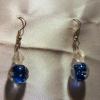 Clear-dark blue Lampwork Glass earrings (23mm drop)

Bead sizes 8mm, 12mm

Silver plated
