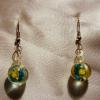 Blue-yellow Lampwork Glass earrings (24mm drop)

Bead sizes 4.5mm, 12.5 mm

Silver plated