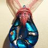 51x32 mm Lampwork Glass Teardrop

Pink ribbon and cotton cord necklace, 
silver plated clasp

51 cm extends to 56 cm