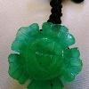 24mm Carved Chrysoprase flower

Adjustable nylon necklace cord