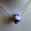 13x8mm Lampwork Glass large-hole bead (Pandora-style)

Silver plated grommet

Weight 5g