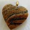 25mm Picture Jasper Heart pendant

Gem weight 27.5ct

Gold plated bail