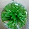 30mm Lampwork Glass pendant with flower design inside

Weight 15.3g

Bail is formed as part of the glass