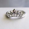 7-stone CZ ring in 14 kt white gold

ring size 5