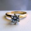 5.5mm CZ in 14kt yellow gold
Tiffany-style setting

ring size 5